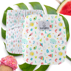 Monthly Bungies Subscription - OPTION 2- Seasonally Inspired Pocket Diaper, Coordinating Solid Diaper and 4 natural Fiber Inserts - Bungies Diapers